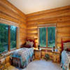 handcrafted log home guest bedroom